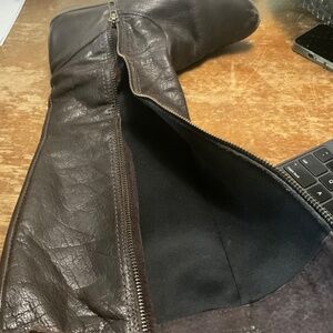 Tall brown leather boots
